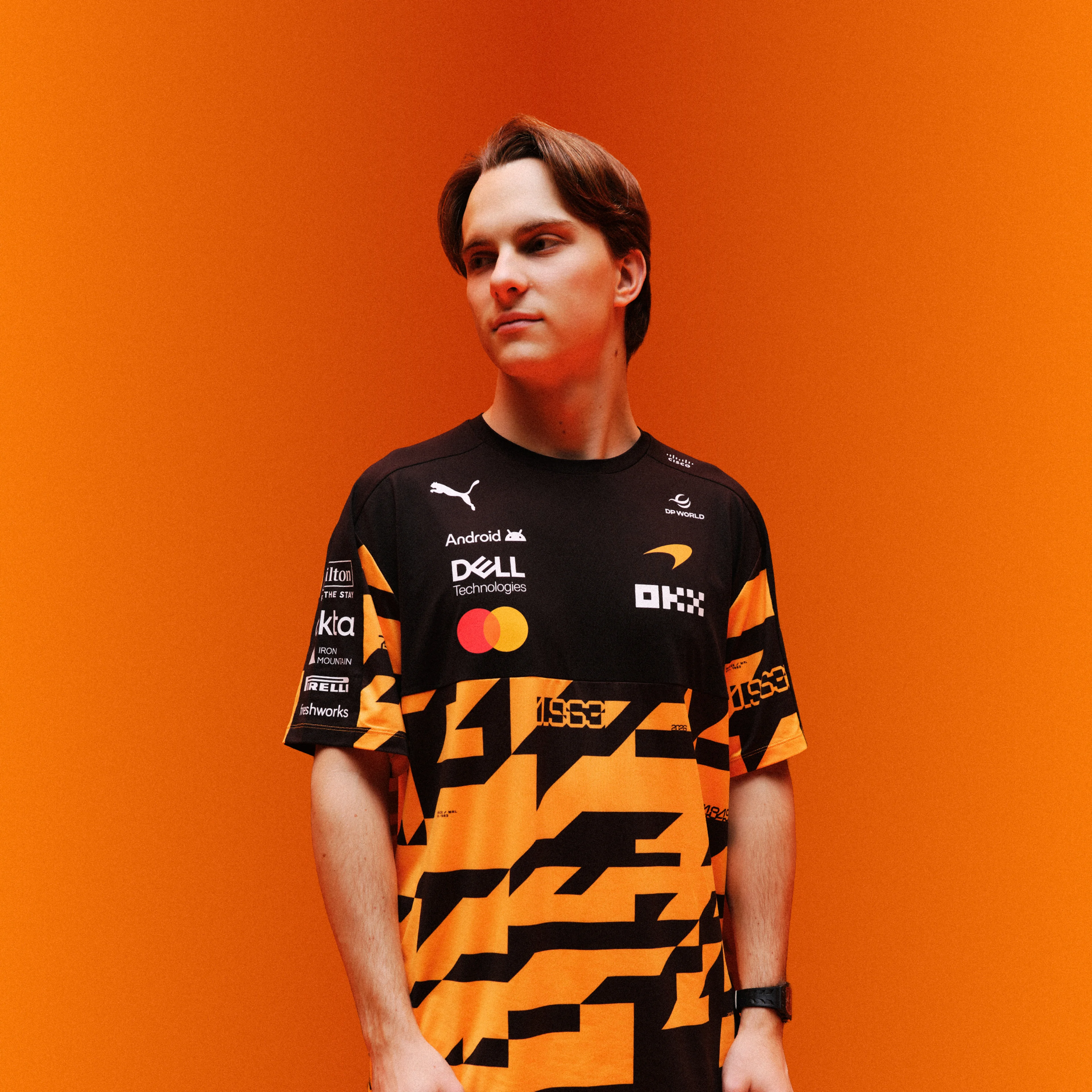 Win a signed 1000th Grand Prix T-shirt