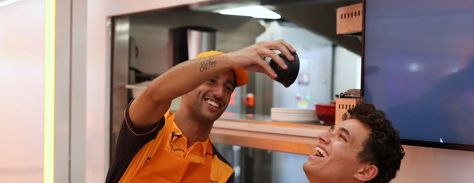 Lando and Daniel take turns guessing McLaren-related phrases whilst wearing noise-cancelling headphones.