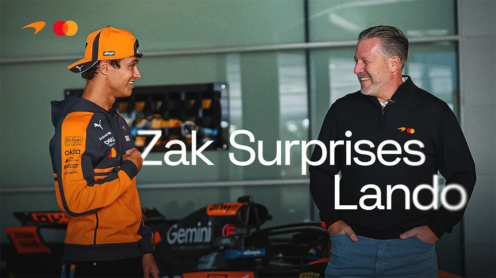 Image - F1 2026 - Zak gifting Lando the MCL39 - Hero