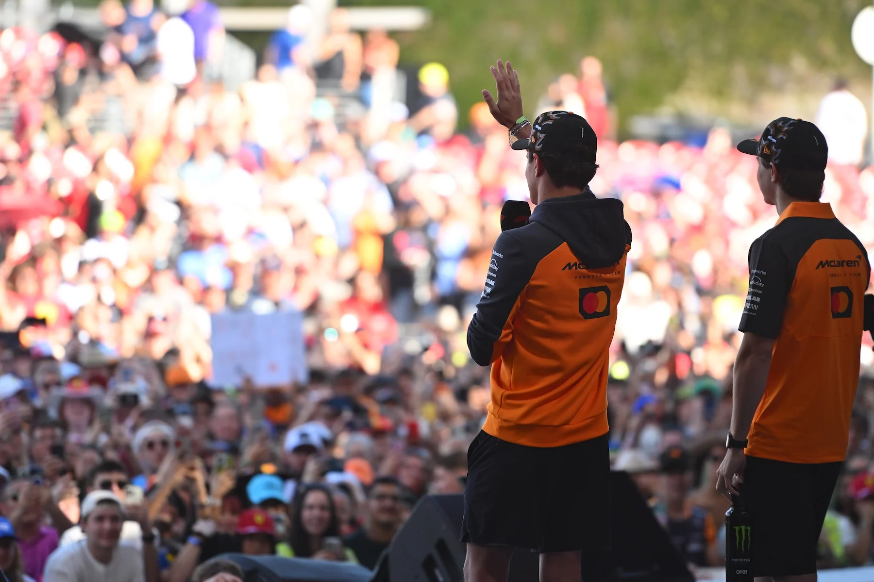 Fantastic fan art, an honorary content creator, and a new look for the MCL39: A fly on the wall look at this weekend's action on and off-track