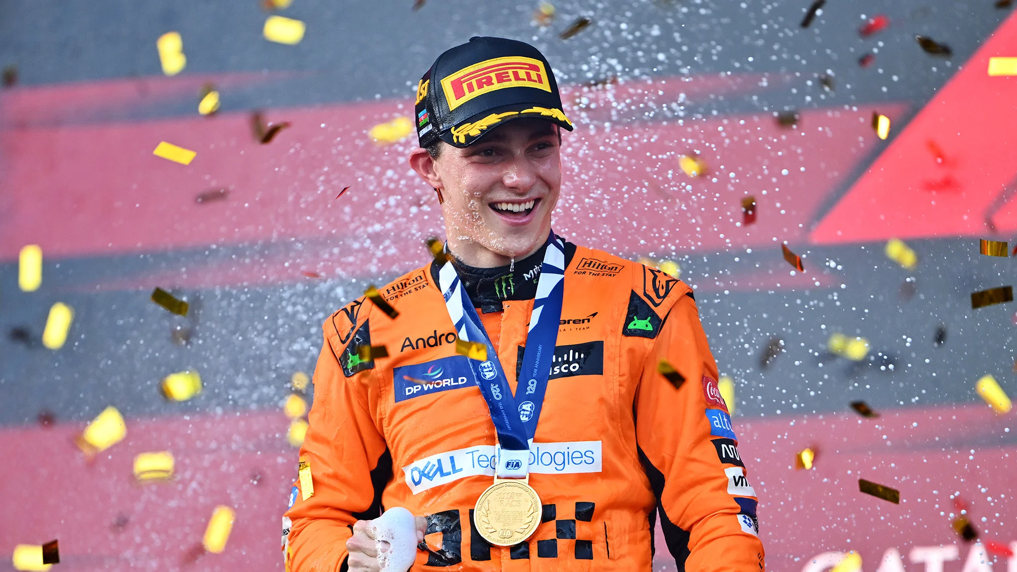 Oscar Piastri on the podium celebrating his win in Baku in 2024