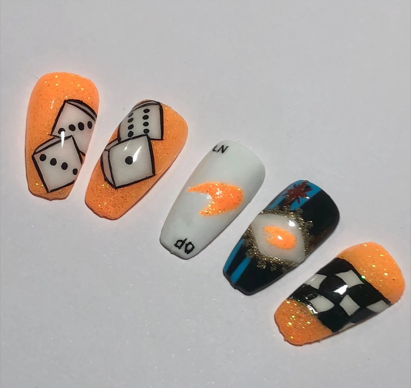 Formula-1 - 2024 - Meet-the-mclaren-fans-who-do-whatever-it-takes-to-support-the-team - Incredible McLaren nail art - 2