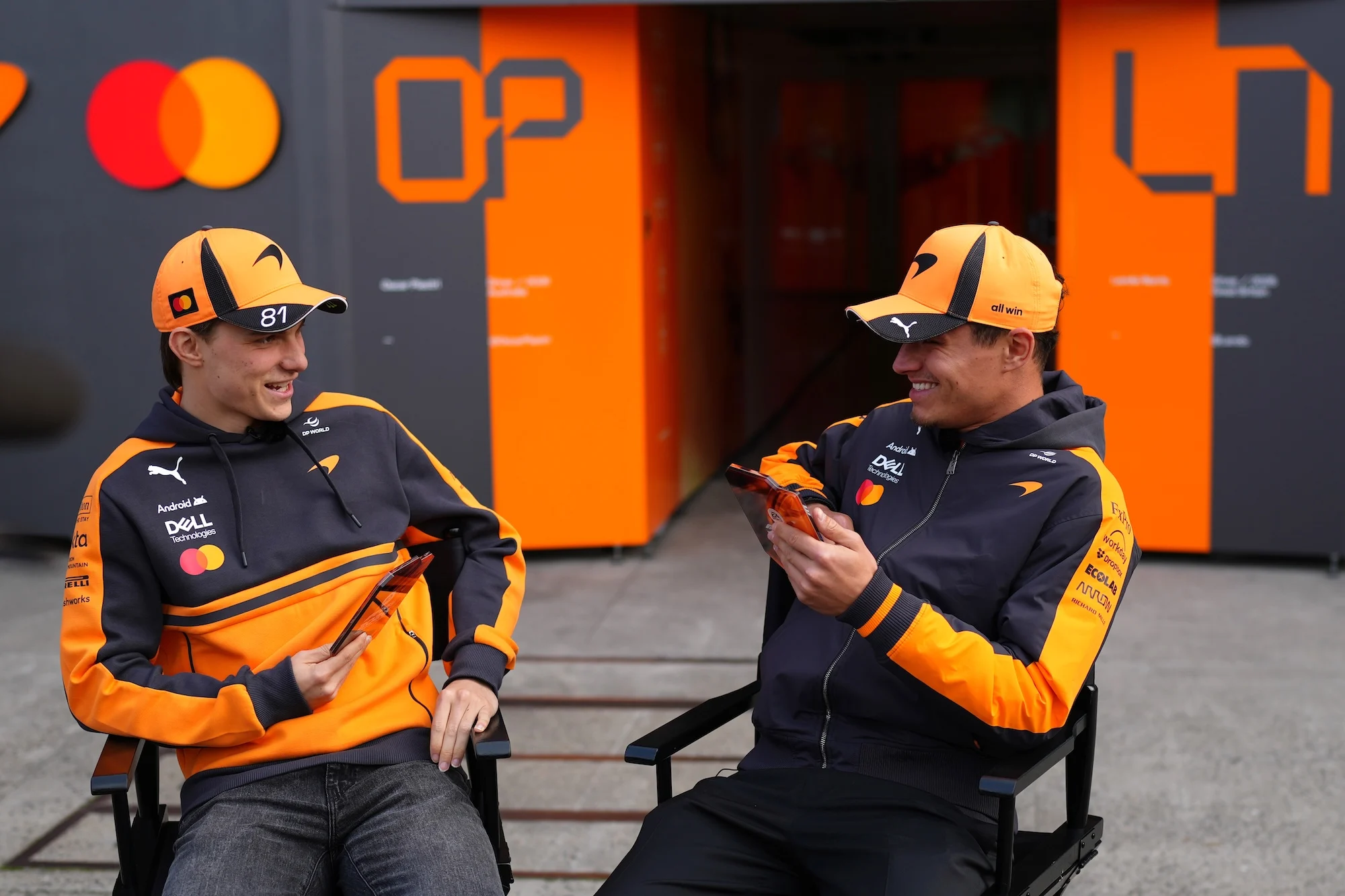 Oscar Piastri and Lando Norris talk in the Paddock during previews ahead of the Chinese grand prix