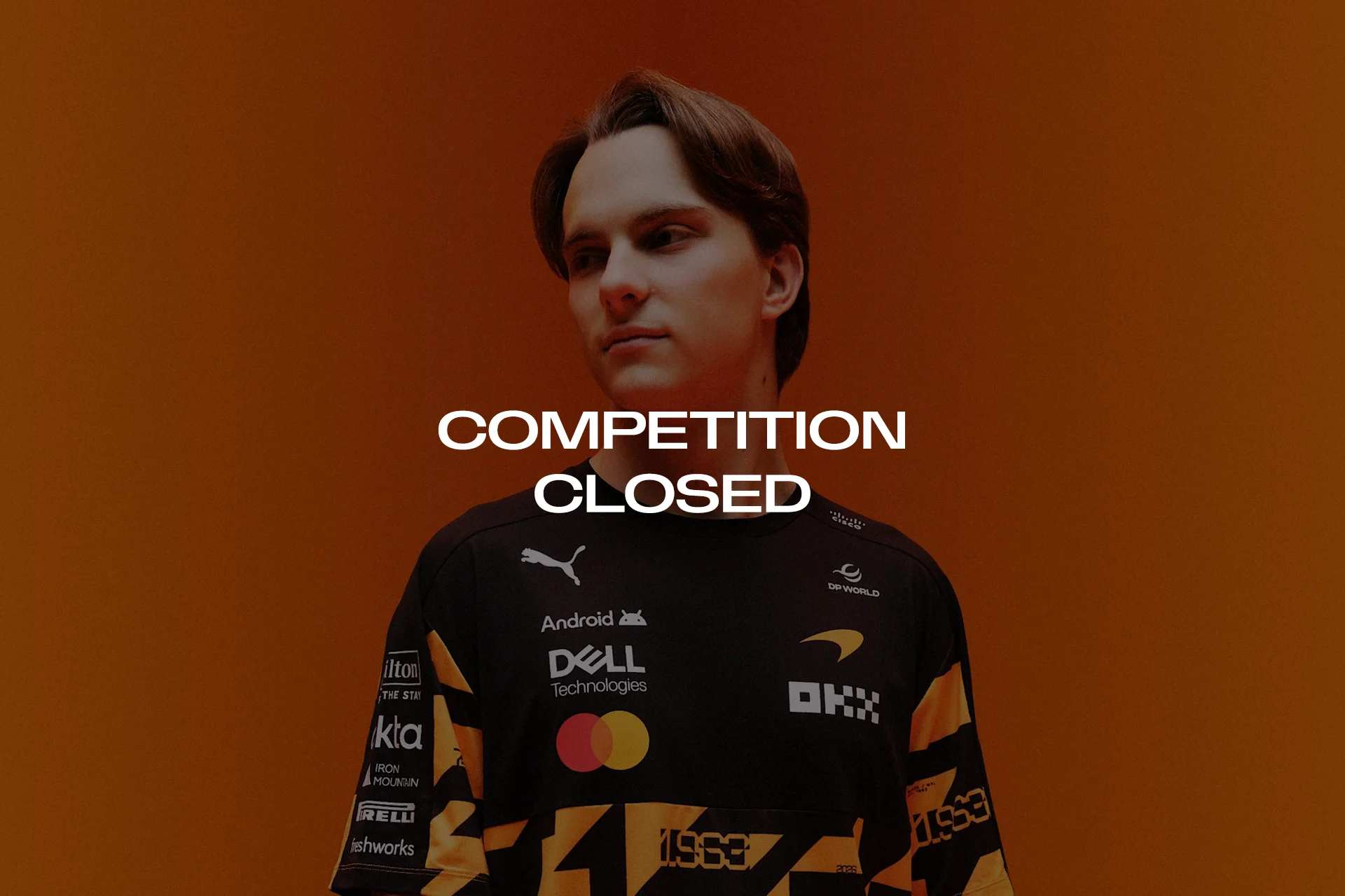 Win a signed 1000th Grand Prix T-shirt