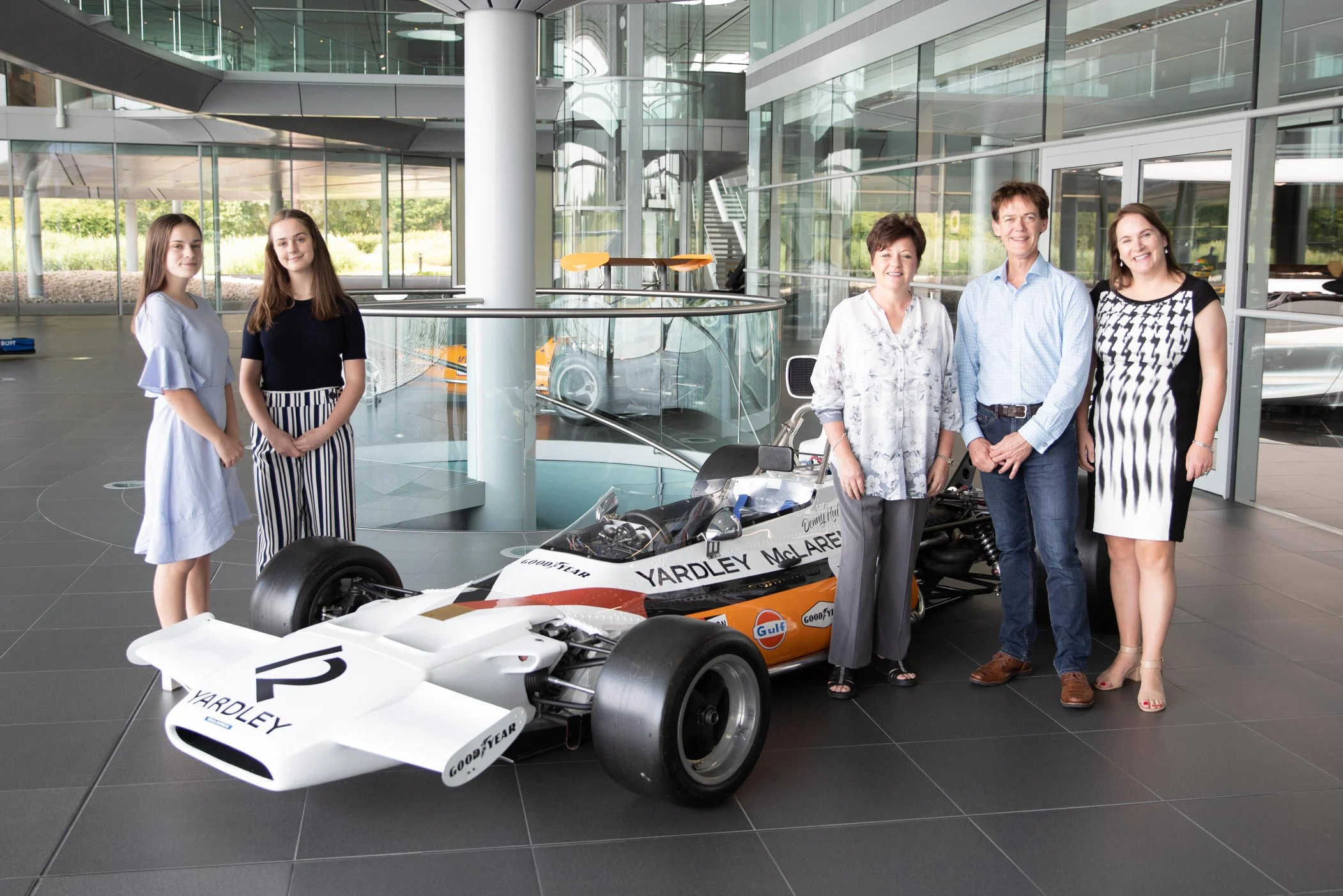 Image - Heritage - Touring the McLaren factory with the children of Bruce McLaren, Denny Hulme, and Chris Amon - 1