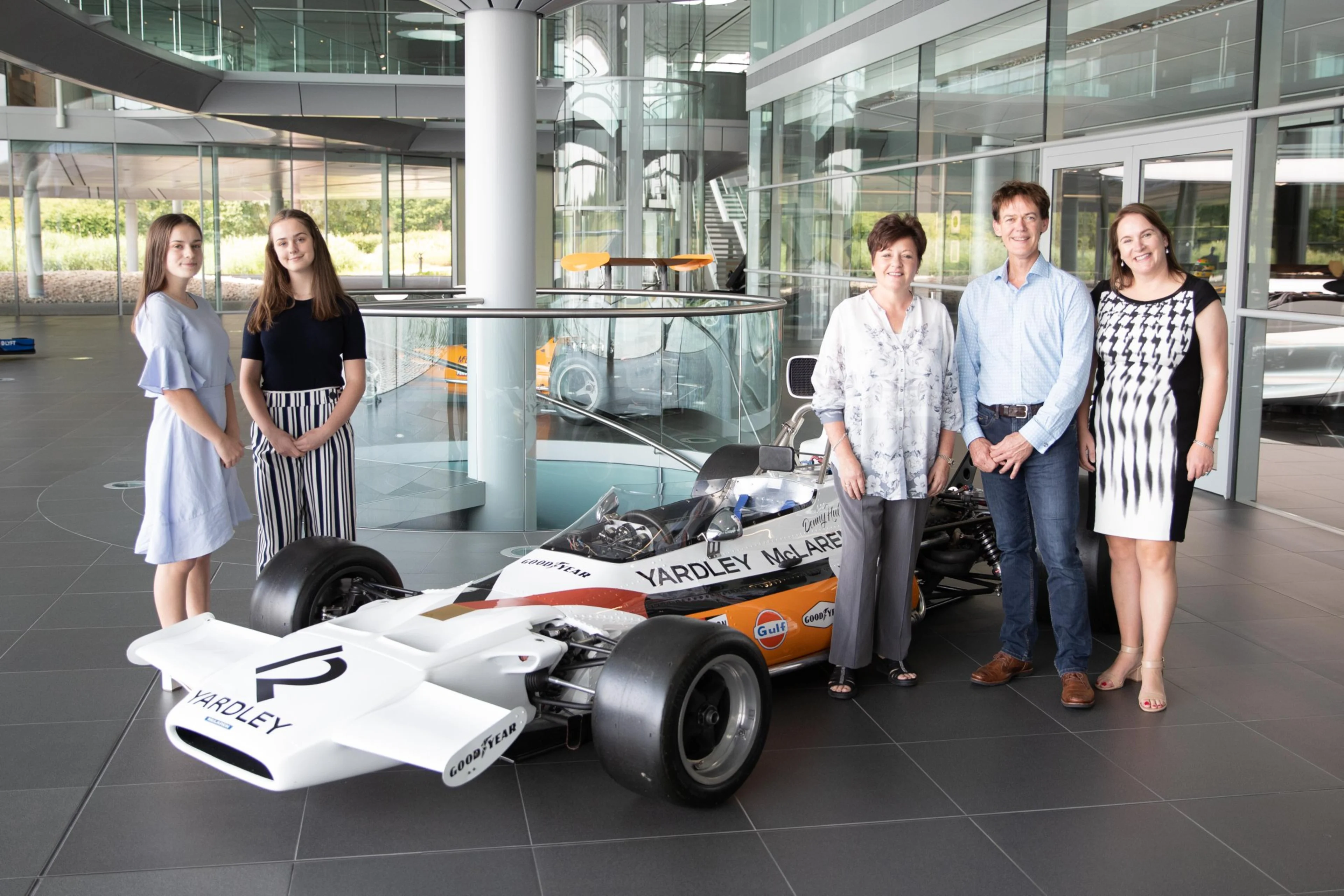 Image - Heritage - Touring the McLaren factory with the children of Bruce McLaren, Denny Hulme, and Chris Amon - 1