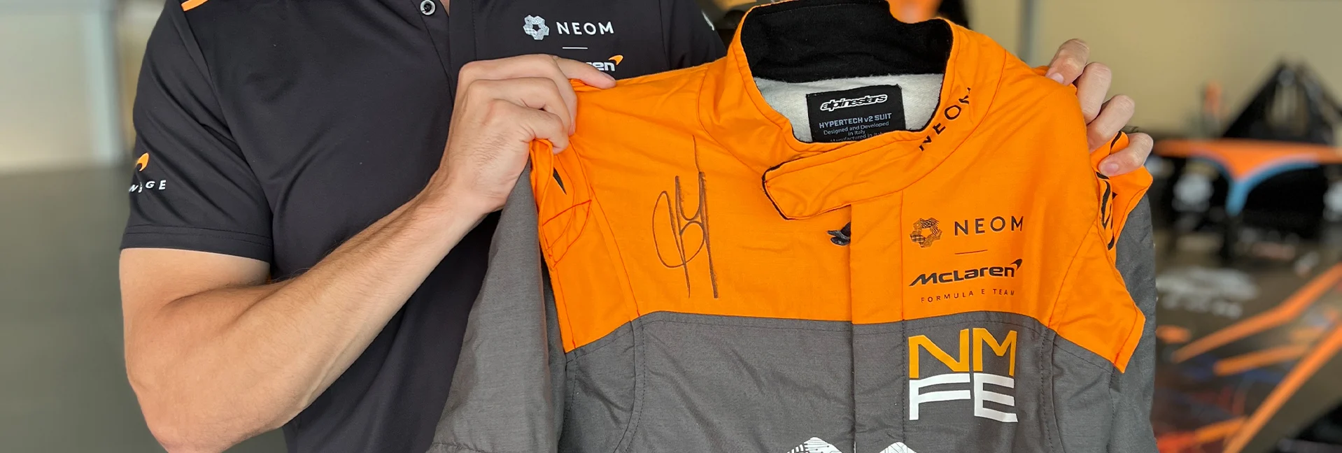Win a signed Jake Hughes race suit