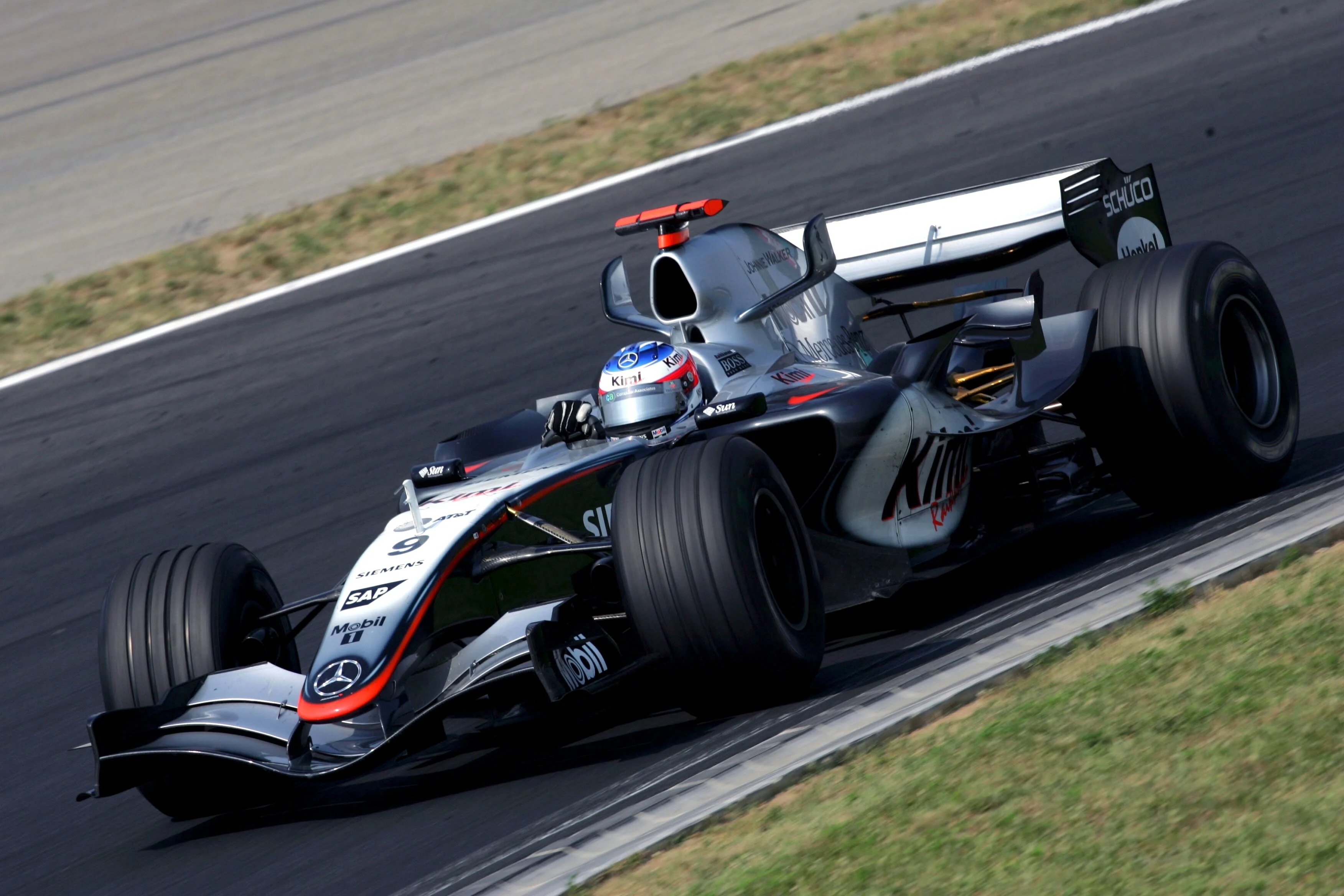 Race winner Kimi Raikkonen in the McLaren Mercedes MP4-20 at the Hungarian Grand Prix in 2005.