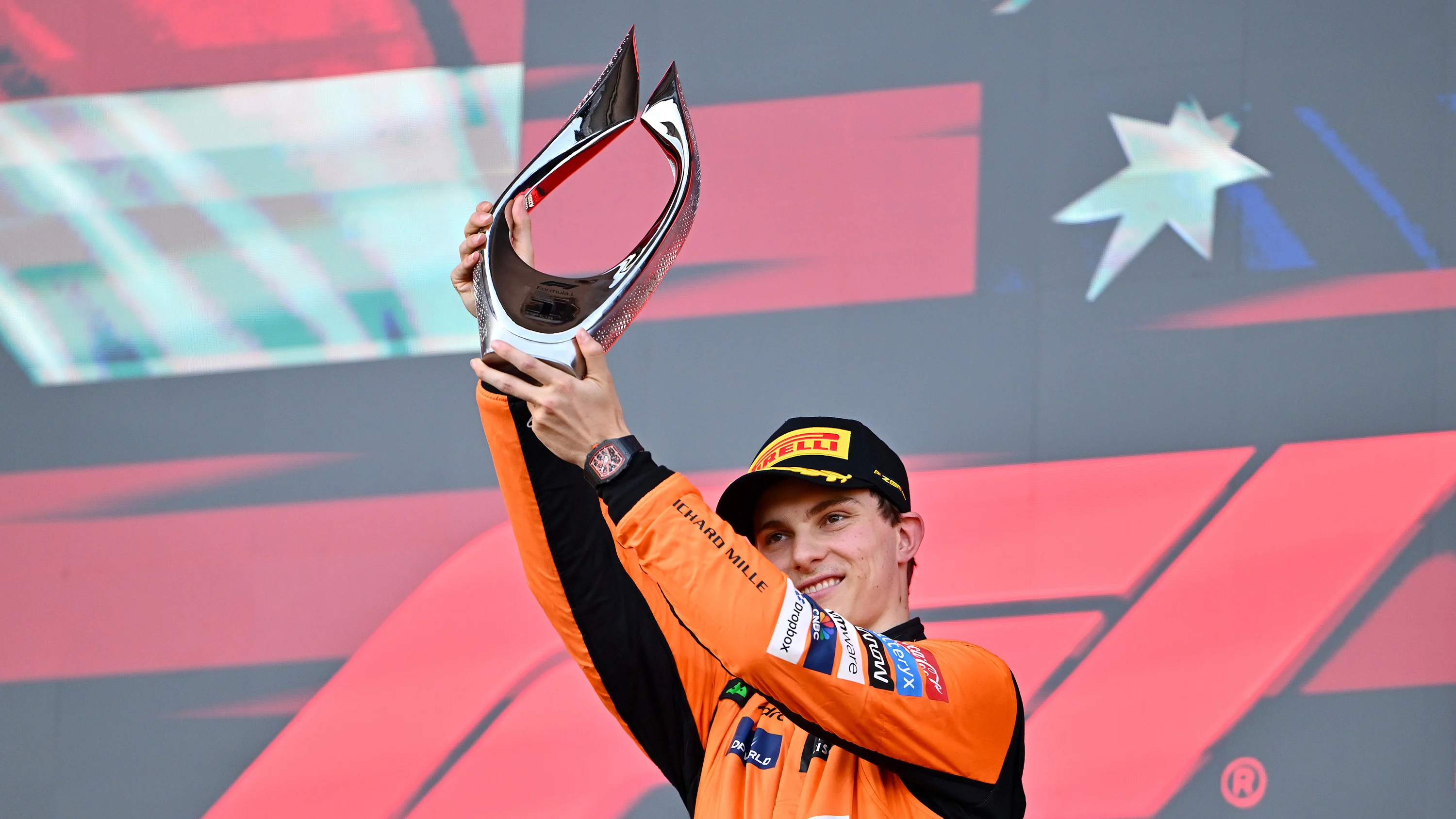 Oscar Piastri on the podium after winning the 2024 Azerbaijan Grand Prix