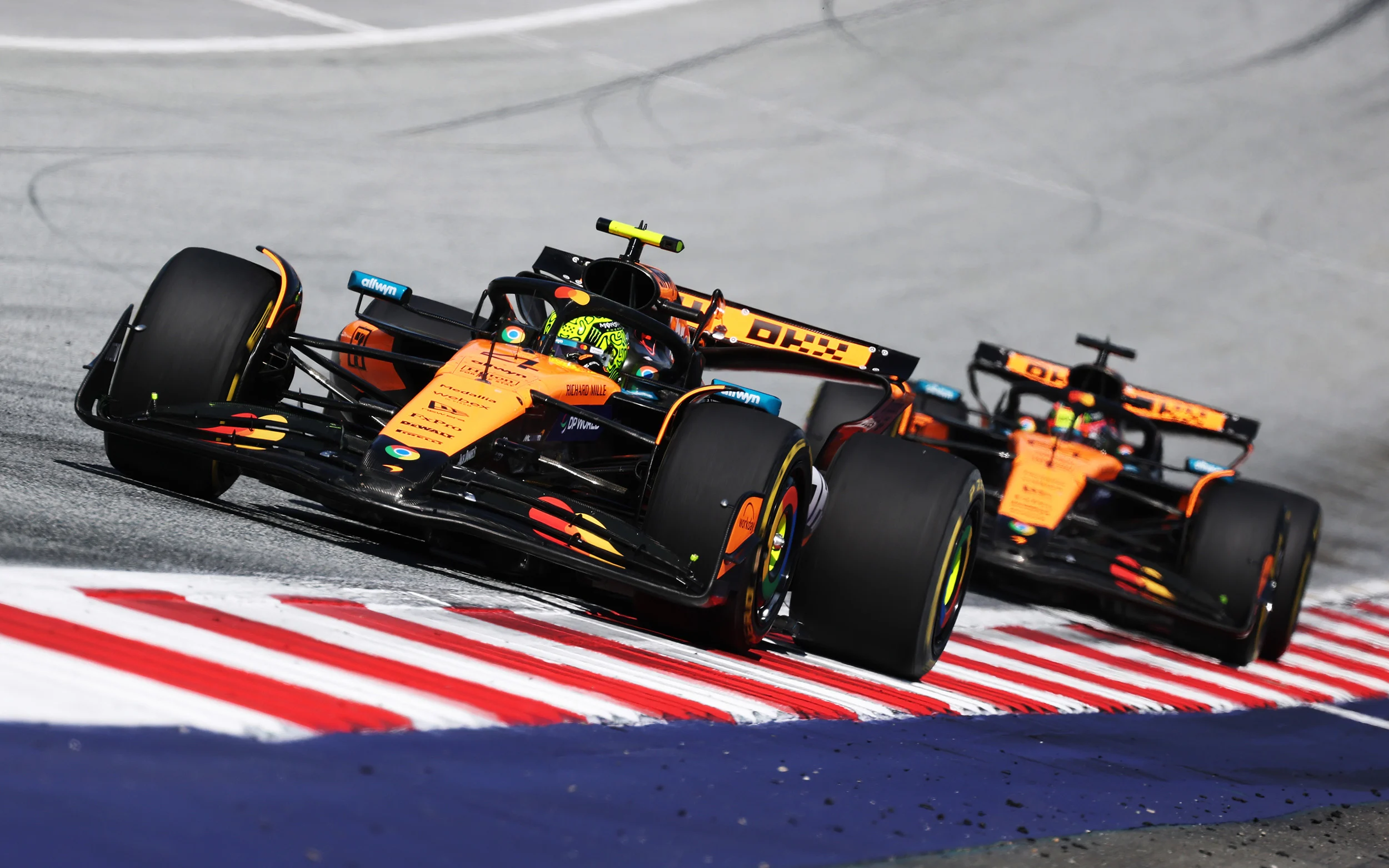 Lando Norris and Oscar Piastri on track at the Austrian GP 2025