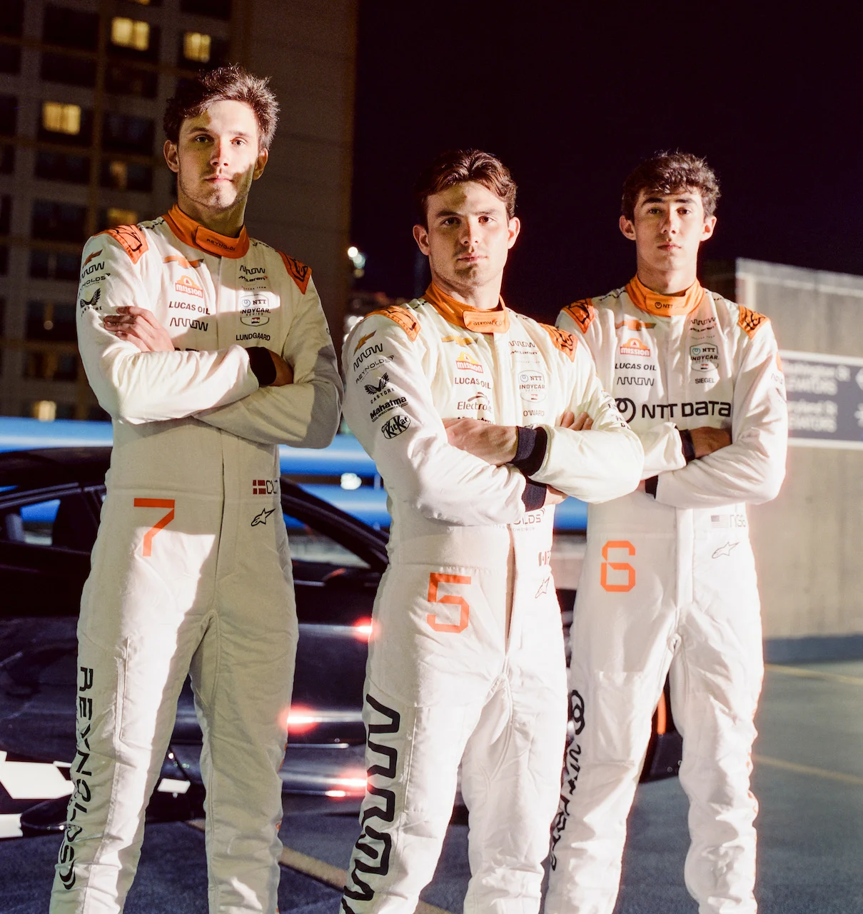 Indycar - 2025 - Arrow-mclaren-unveils-indianapolis-500-firesuits - "Never Stop Racing" Firesuits for the Indianapolis 500 - 2