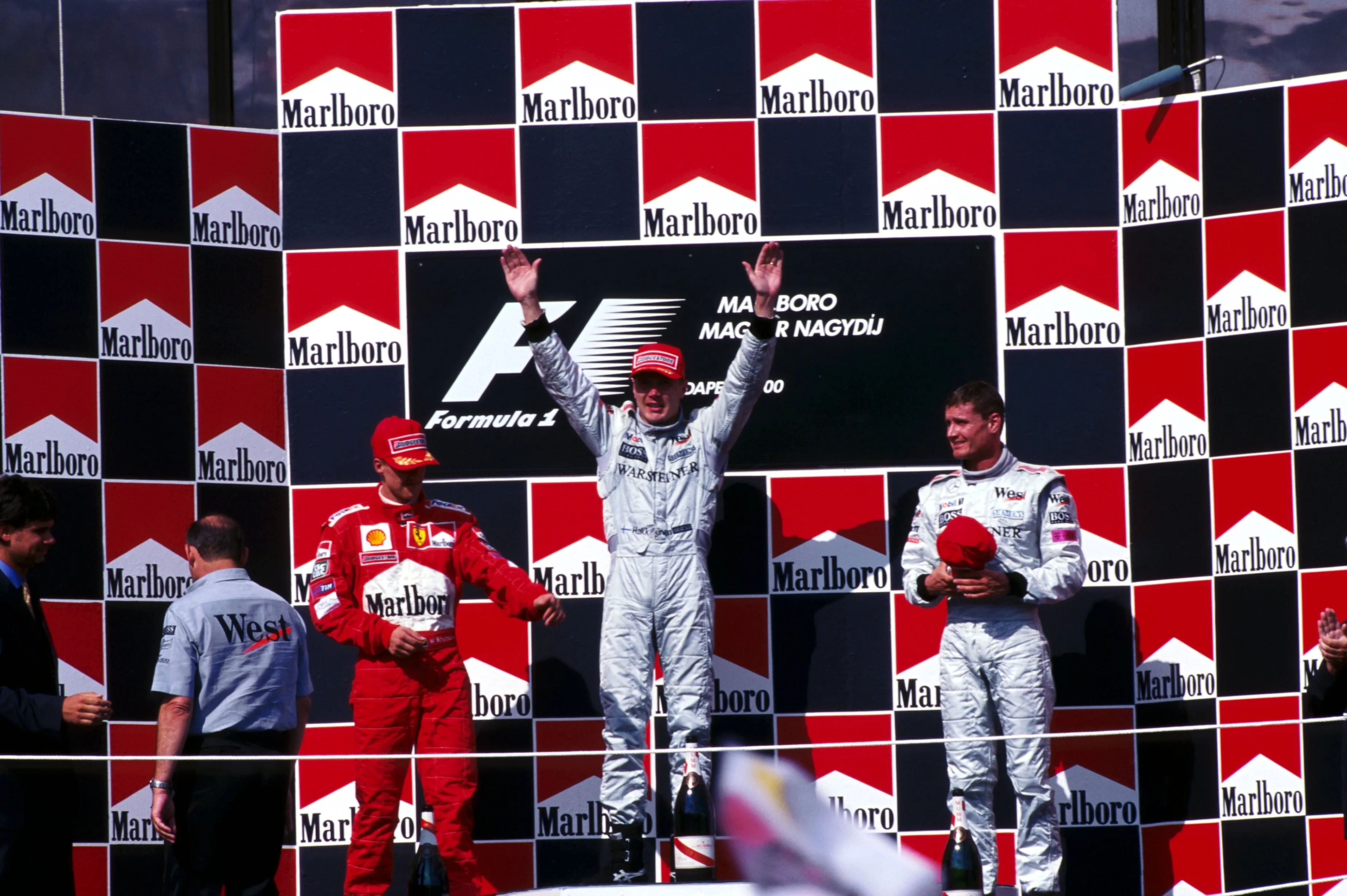 Mika Häkkinen on the podium after a win in Hungary in 2000