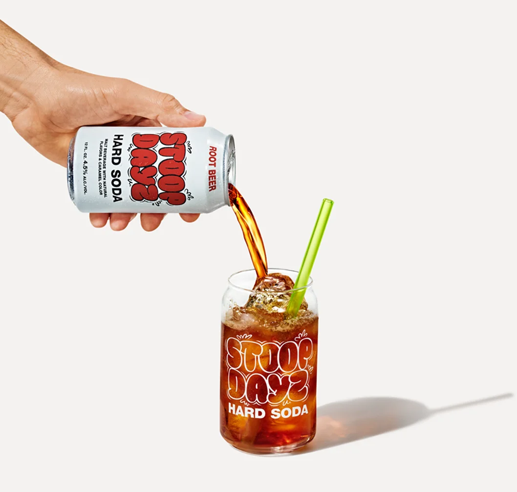Root Beer Stoop Dayz Hard Soda being poured into a glass