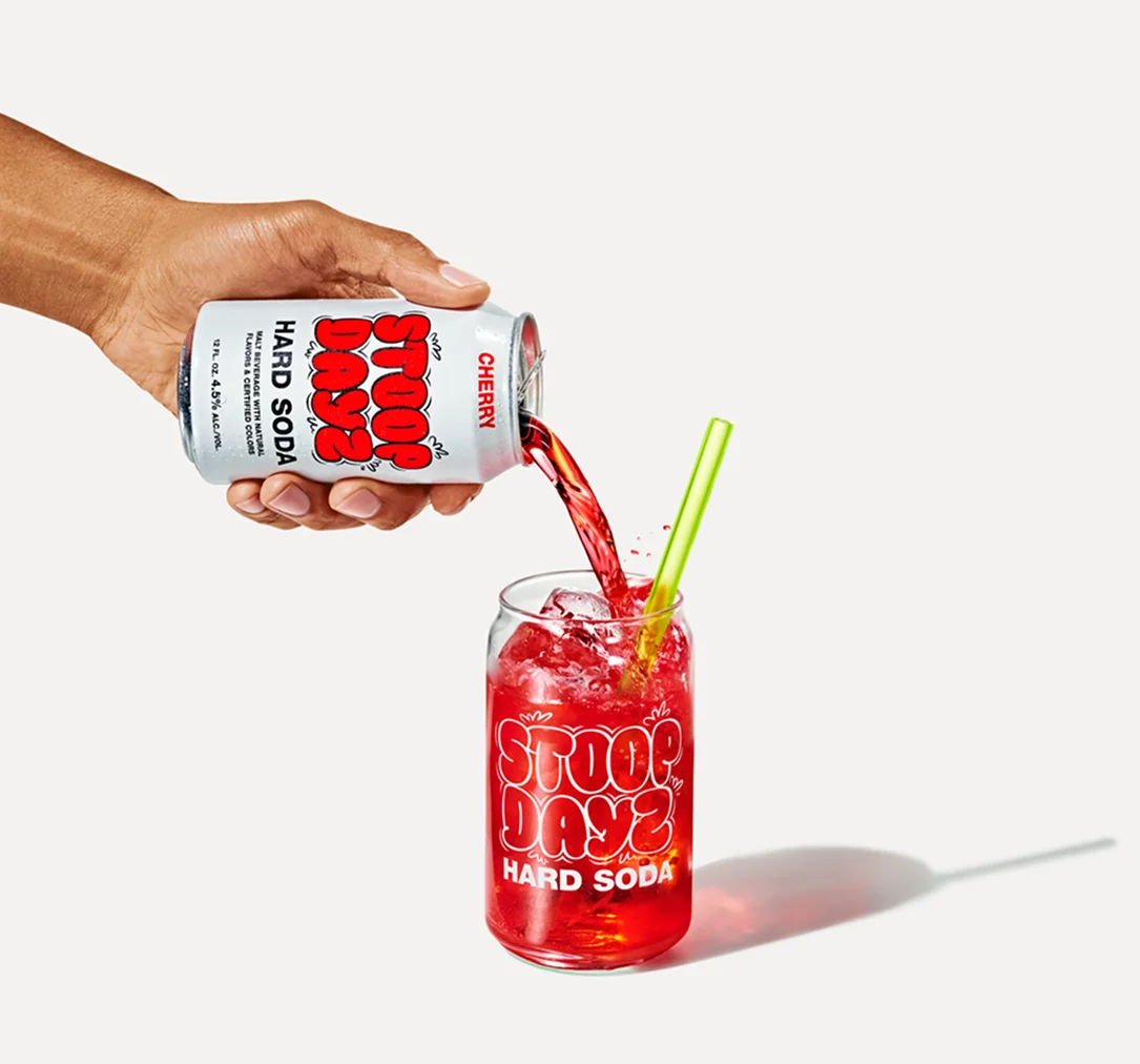 Cherry Stoop Dayz Hard Soda being poured into a glass
