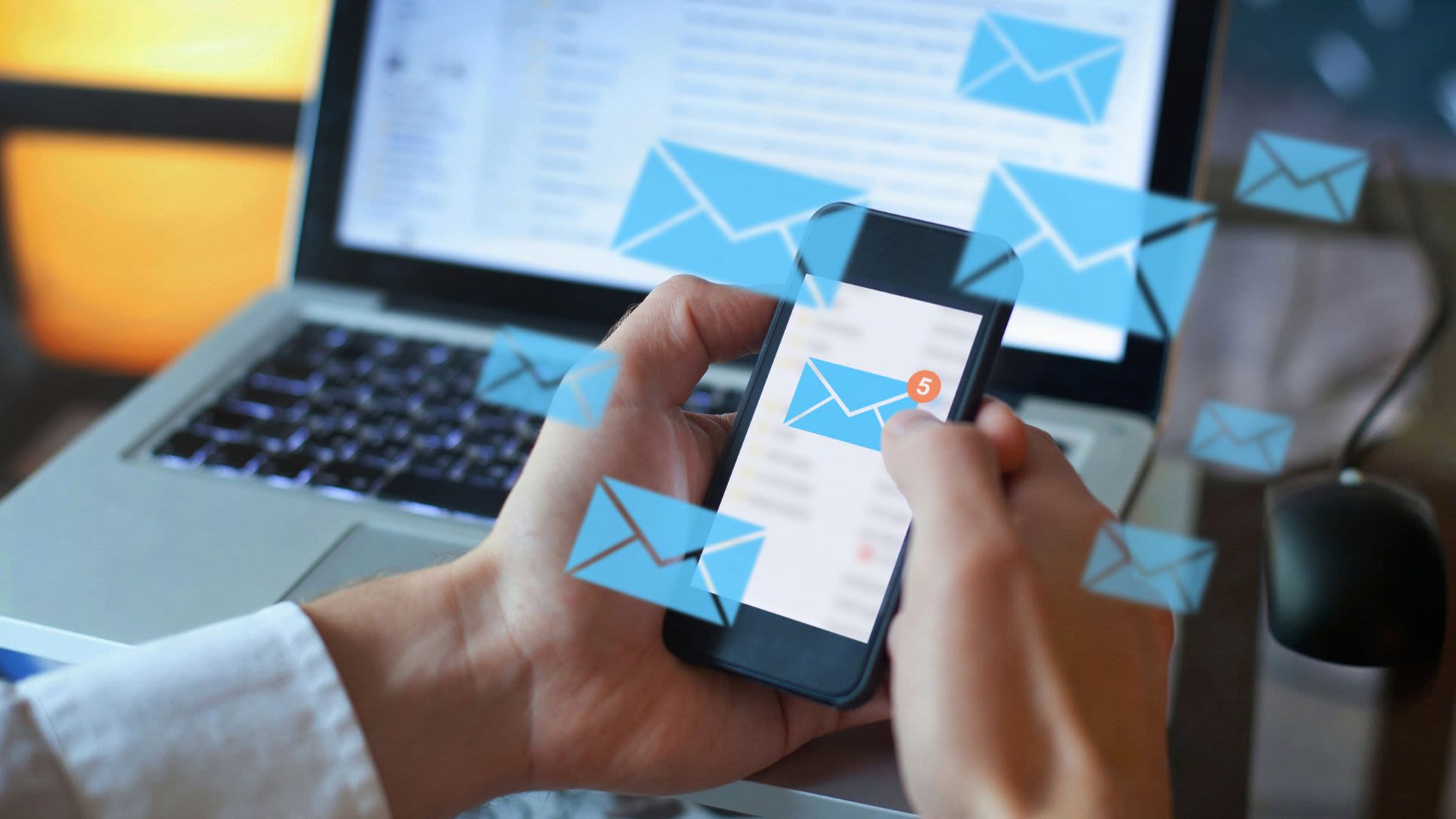 This image shows a smartphone receiving multiple email notifications. It is intended to illustrate the article "Maximize the Delivery of Your Transactional Emails with AWS SES".