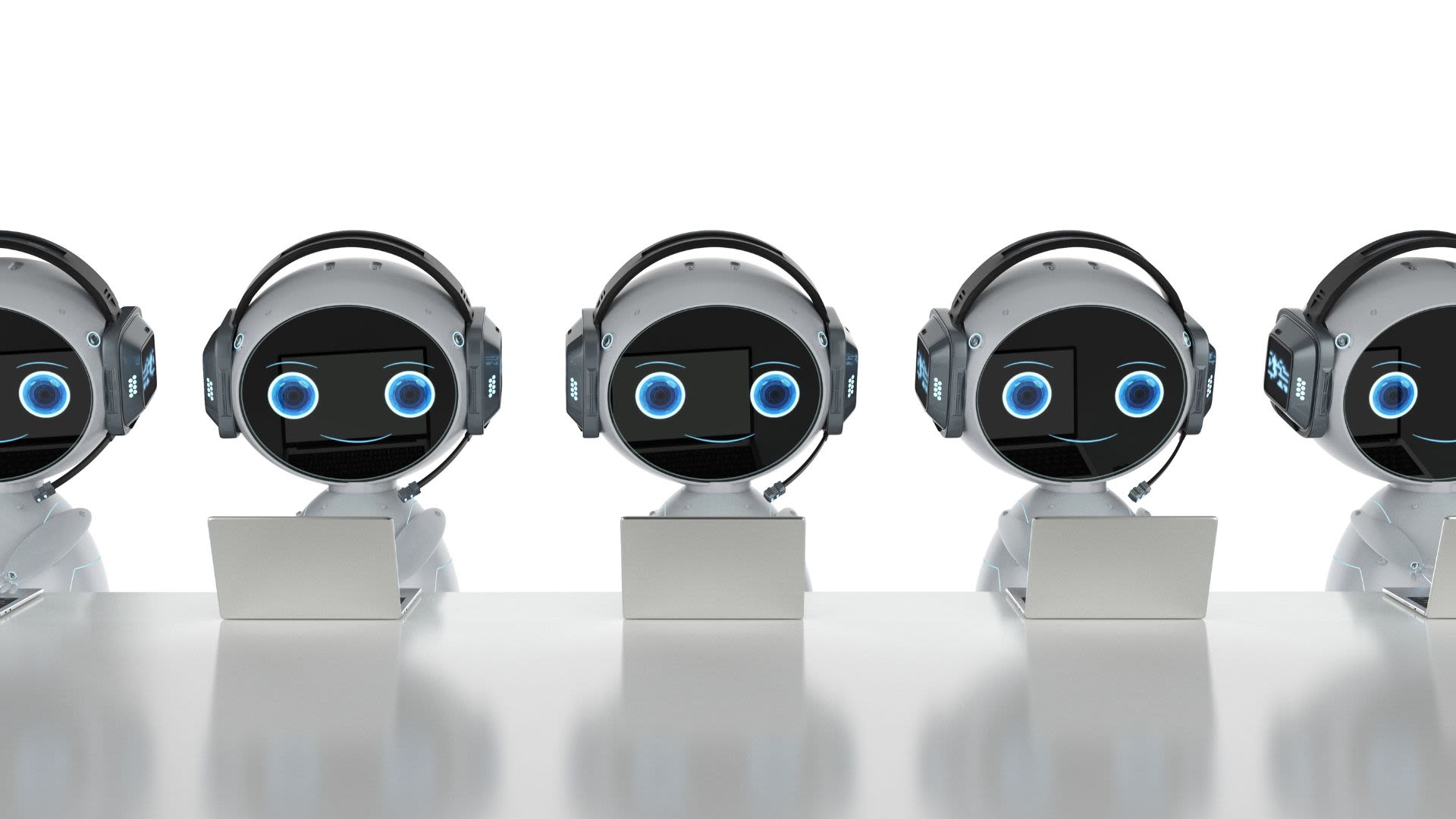 This image shows several small robots sitting in front of laptops. It is meant to symbolize the automation of email communication.