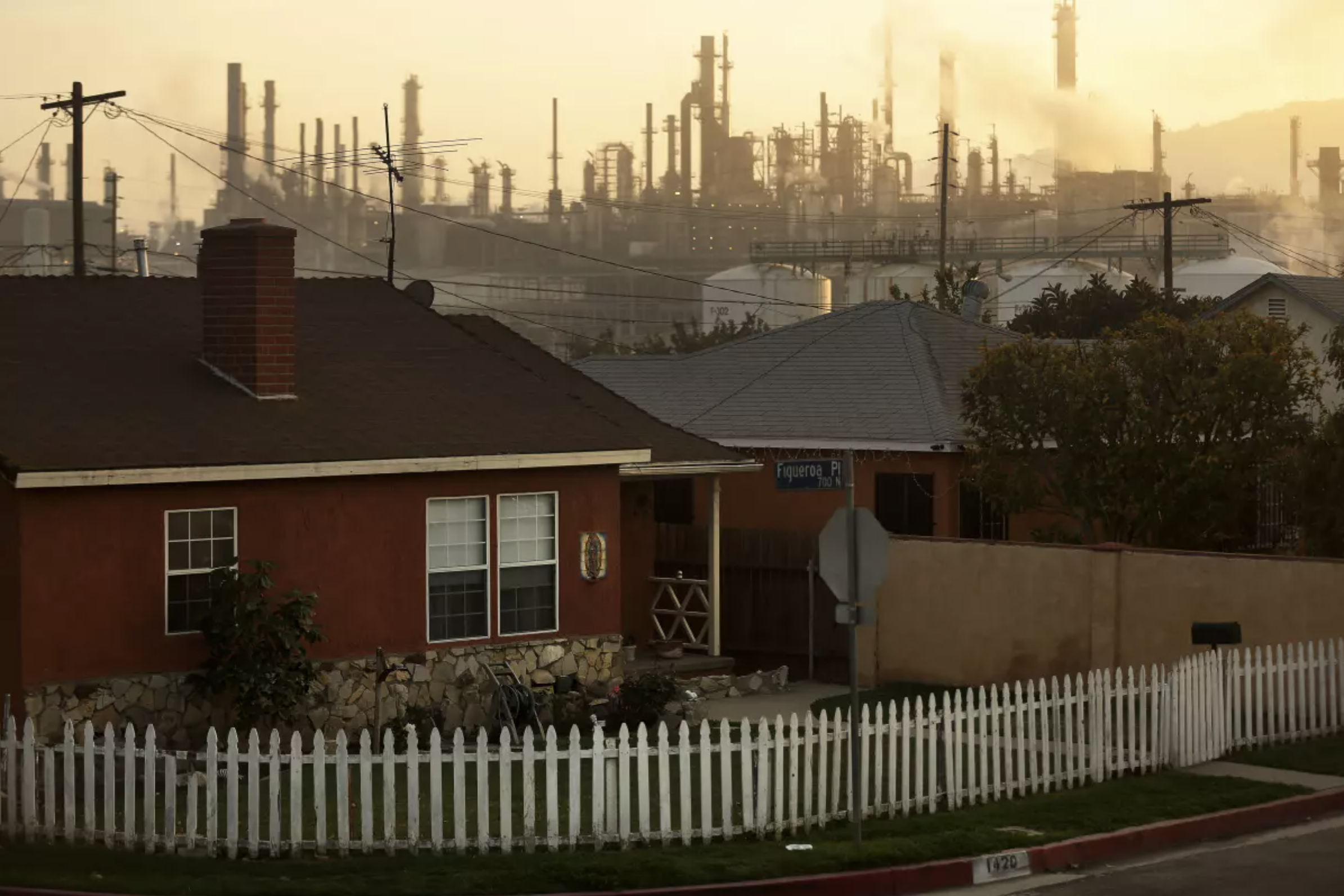 An oil refinery looming over a Los Angeles neighborhood