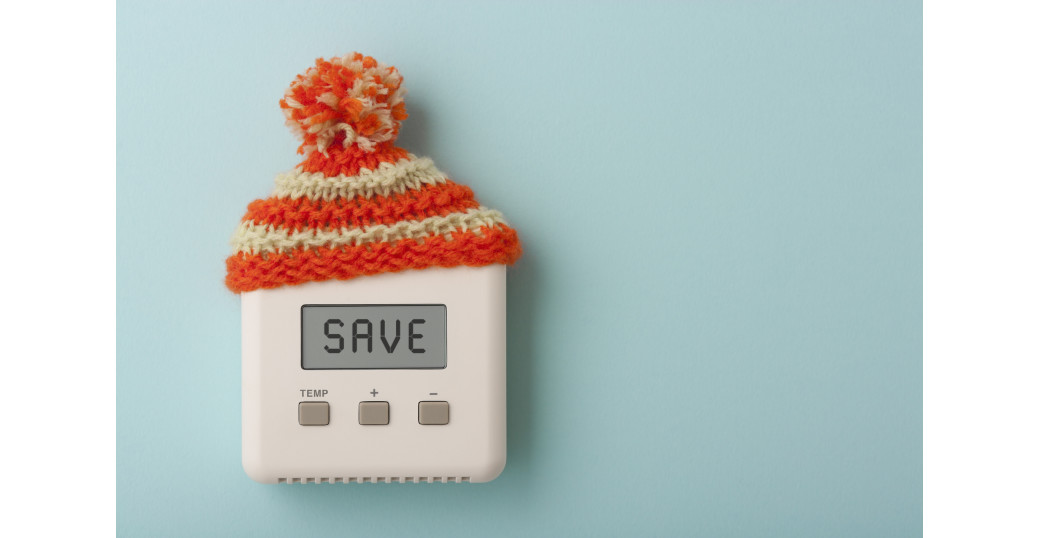 Thermostat with a winter hat.