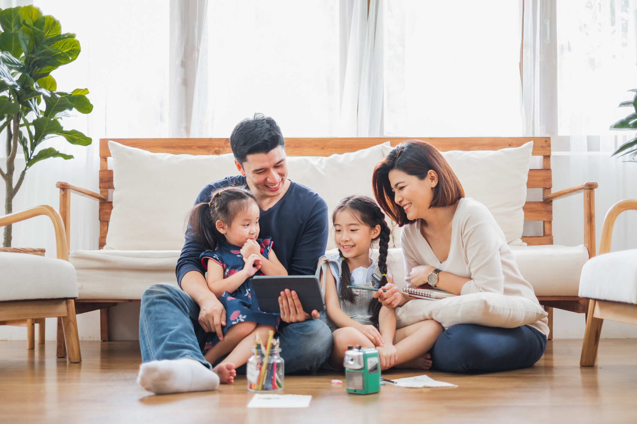 Family sitting in their home