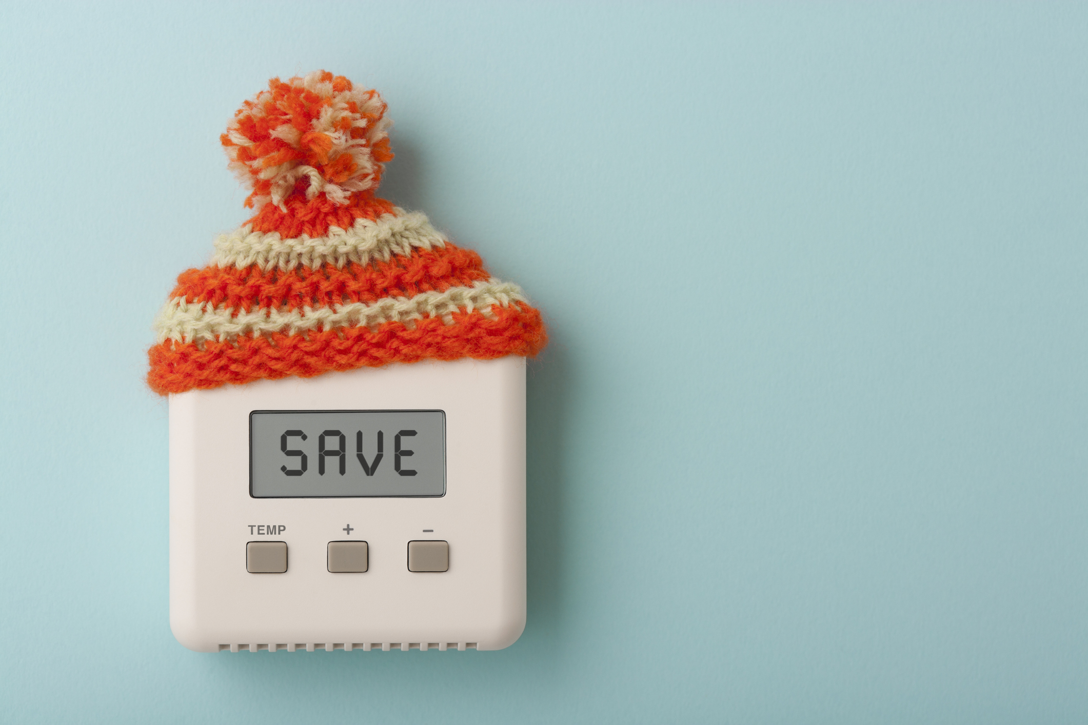 thermostat with knit hat on