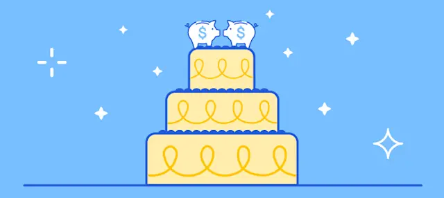 A wedding cake with piggy banks on top, symbolizing wedding costs.