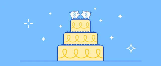 A wedding cake with piggy banks on top, symbolizing wedding costs.