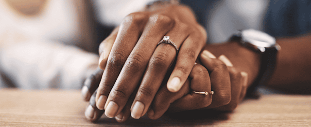 Couple with new engagement rings