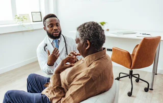 Doctor helping out a patient