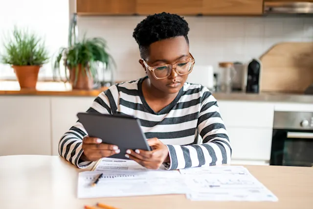 Woman looking over documents