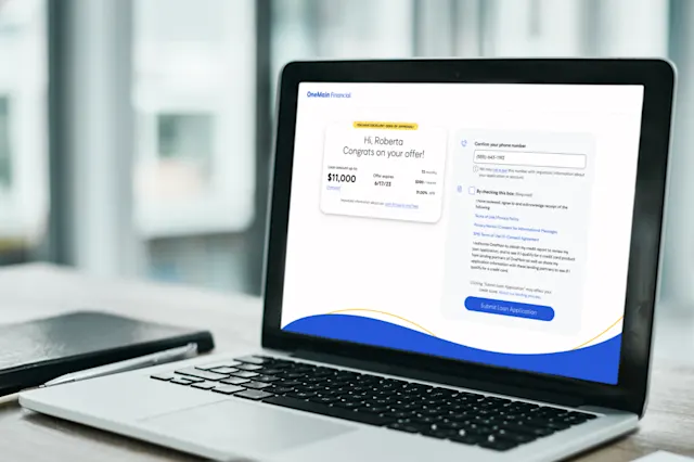 Open laptop with OneMain Financial website on screen