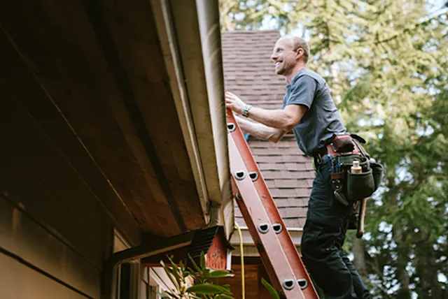 A man climbing stares