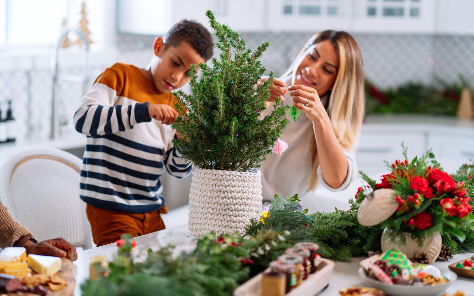 Image of mom and son with Christmas tree