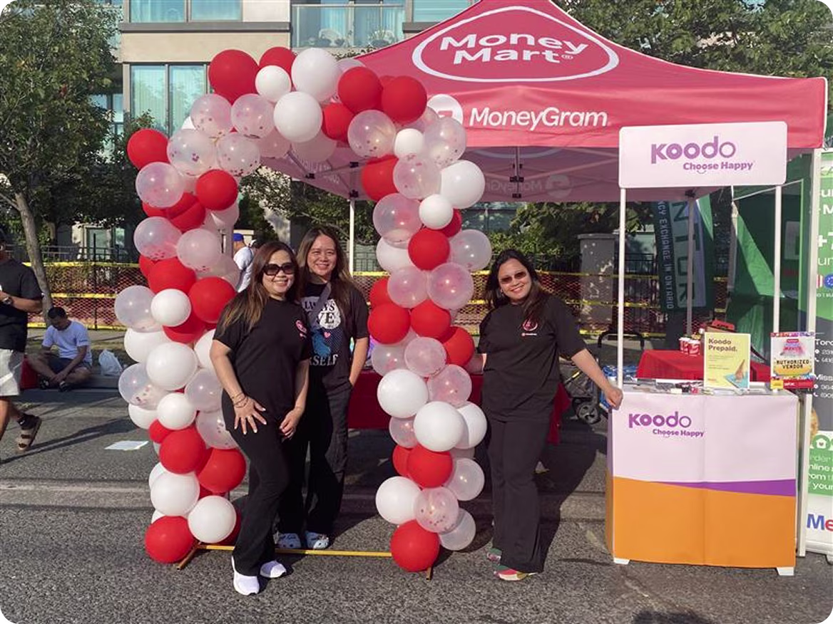 Employees at Money Mart event.