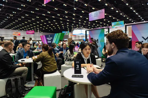 Delegates at Money20/20 Asia in Bangkok discussing