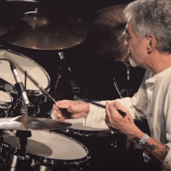 Steve Gadd on Neumann KM84. Photo Credit: YouTube (https://www.youtube.com/watch?v=35I70ZgeZeI)