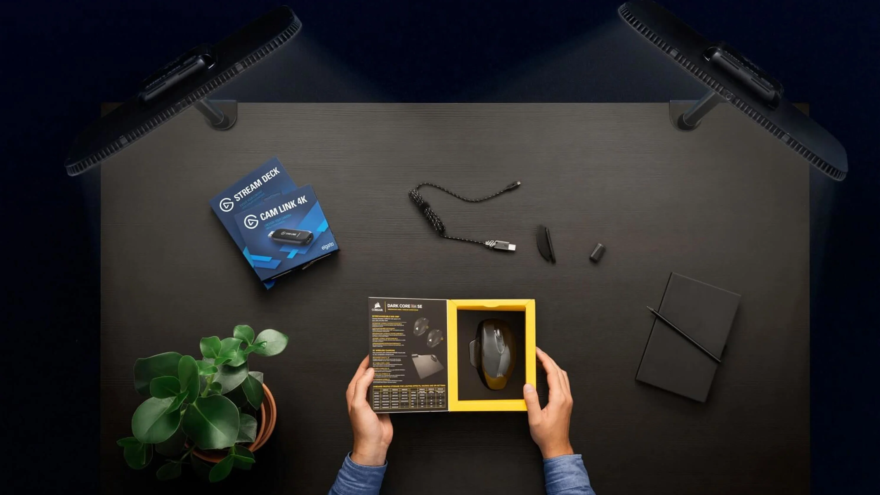 Content creator unboxing a Corsair mouse using two Key Lights in the setup