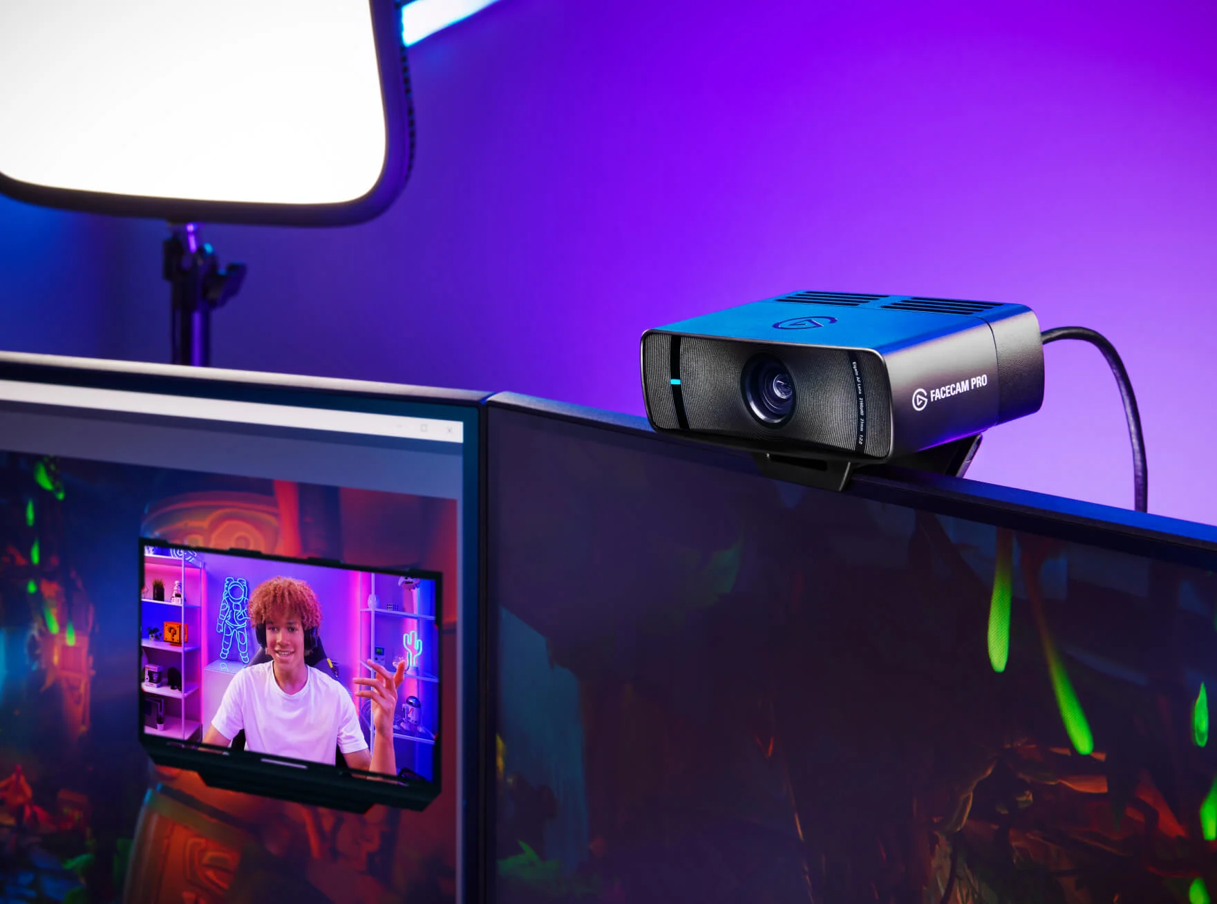 Facecam Pro 4K60 webcam mounted on a desktop monitor