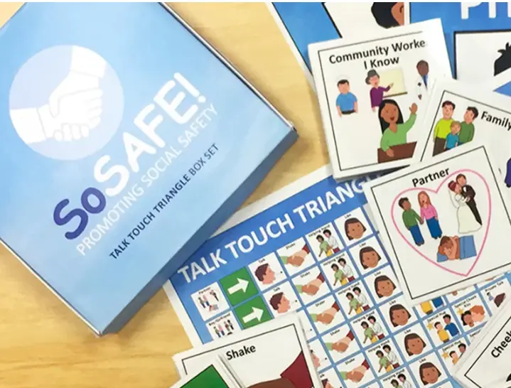 SoSAFE! Talk Touch Triangle Box Set, showing a blue box labeled 'Promoting Social Safety' with various educational cards and charts spread around it.