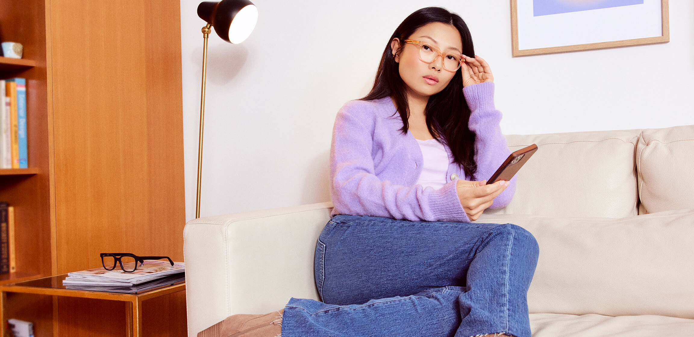 Woman wearing Hubble eyeglasses while enjoing time at home