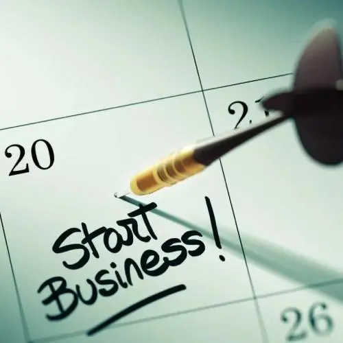 Dart in a calendar with caption: start business!