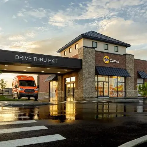 Tide Cleaners location with an orange branded van