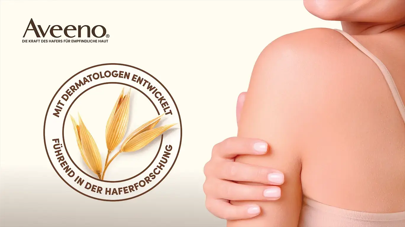 Aveeno – Die Kraft des Hafers für Empfindliche Haut – Model mit Schulterblick – Siegel mit Hafer und dem Text „mit Dermatologen entwickelt“ sowie „führend in der Haferforschung)