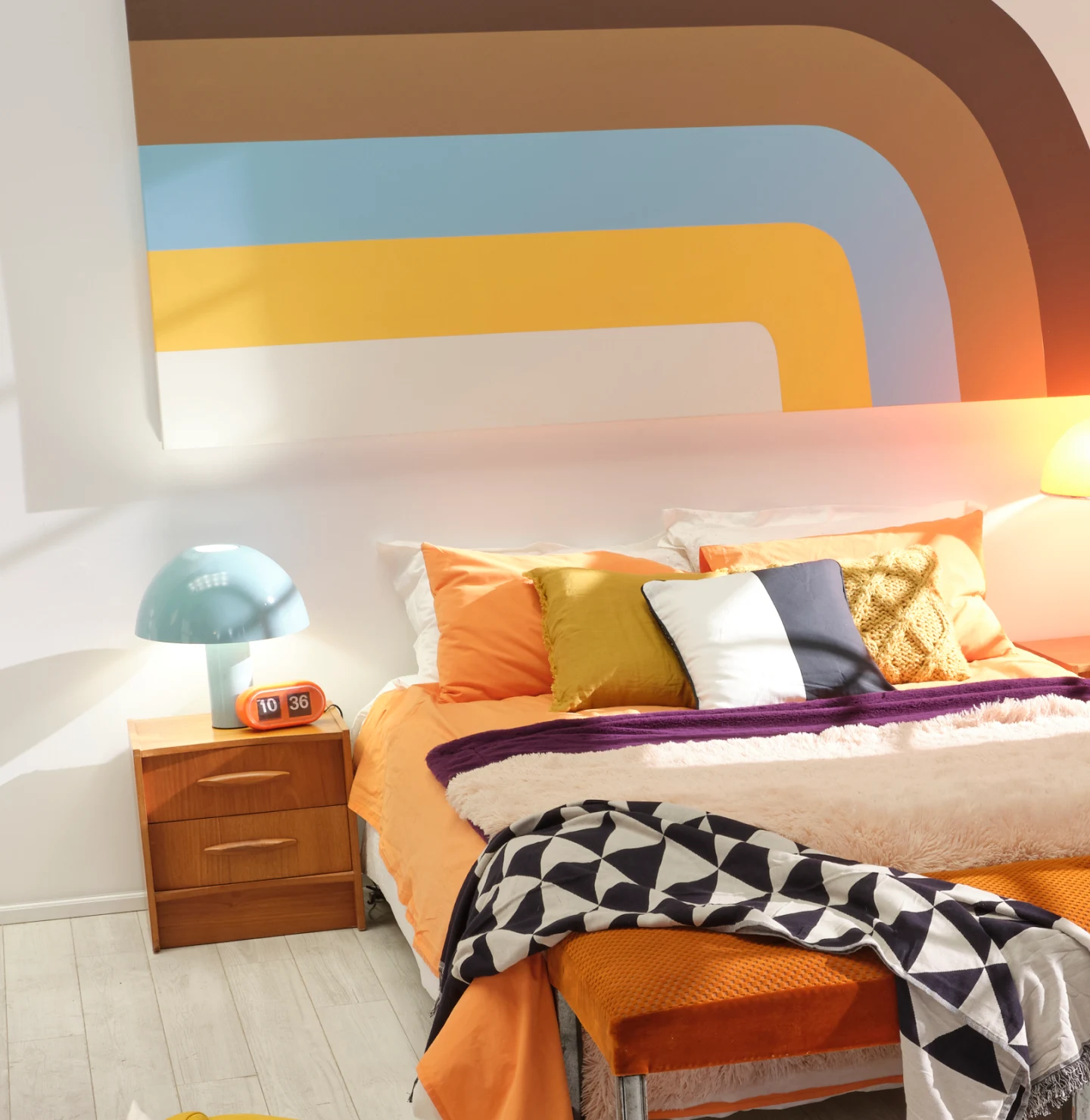 Close-up of a partial bedroom in 70s-inspired decor