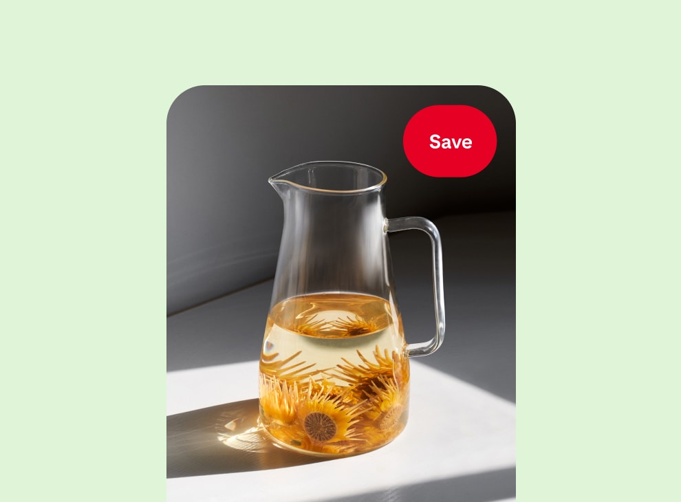 Pin of a drink pitcher with a save button in the top right corner, centered on a pea green background. 