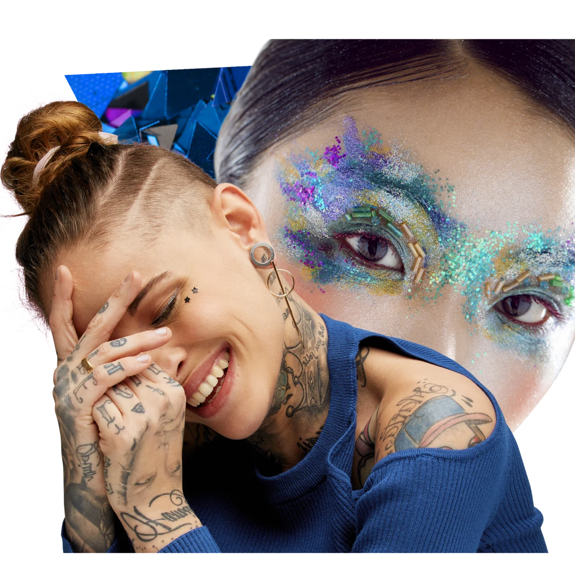 Woman with hand tattoos and top ponytail smiles, partially covering her face with her hands. Woman with vibrant blue eye makeup.
