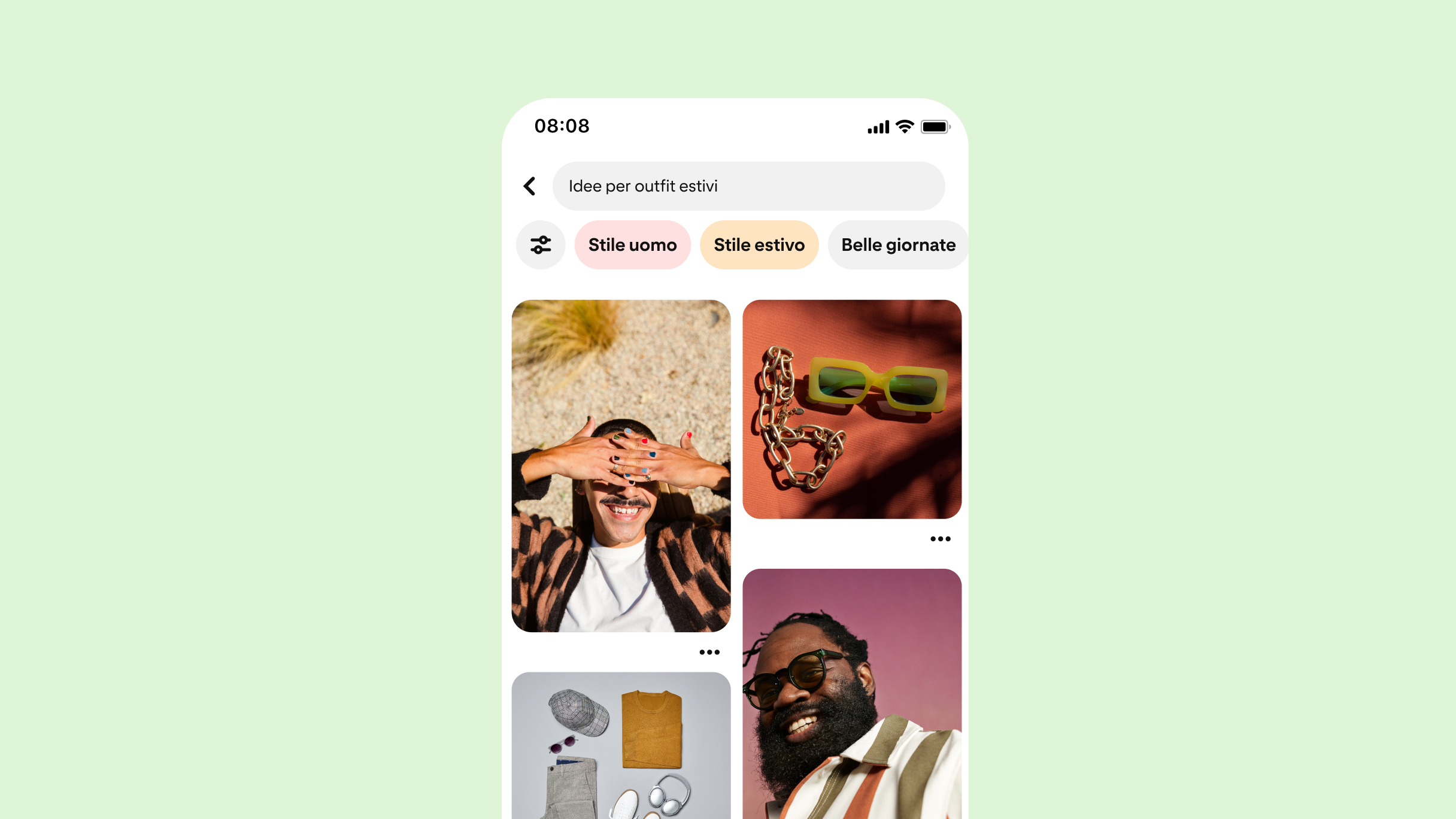 Feed di Pinterest con la frase "Idee per outfit estivi" scritta nella barra di ricerca. Quattro diversi Pin ispirati all'estate popolano il feed.