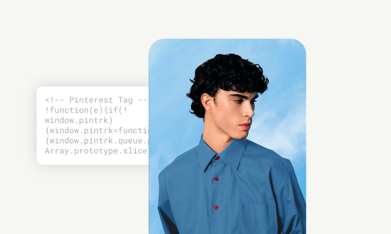 A person wearing a dark blue button up shirt; “Pintereset tag” and  code is written on the side