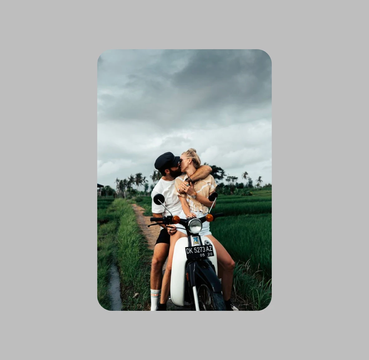 Couple embracing on a motorcycle
