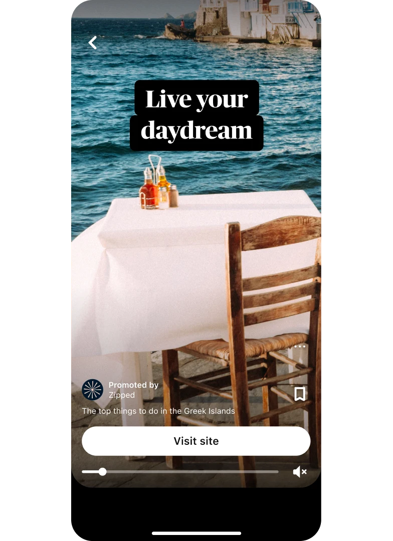 Idea ad preview thumbnail showing a dining table with a waterfront view titled “Live your dream” with a “Visit site” button placed center bottom.
