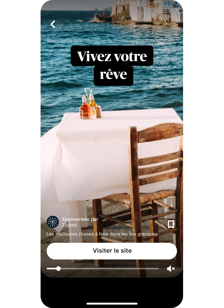 Vignette d’aperçu de l’annonce Idée représentant une table en bord de mer intitulée « Vivez votre rêve », avec un bouton « Visiter le site » en bas au centre.